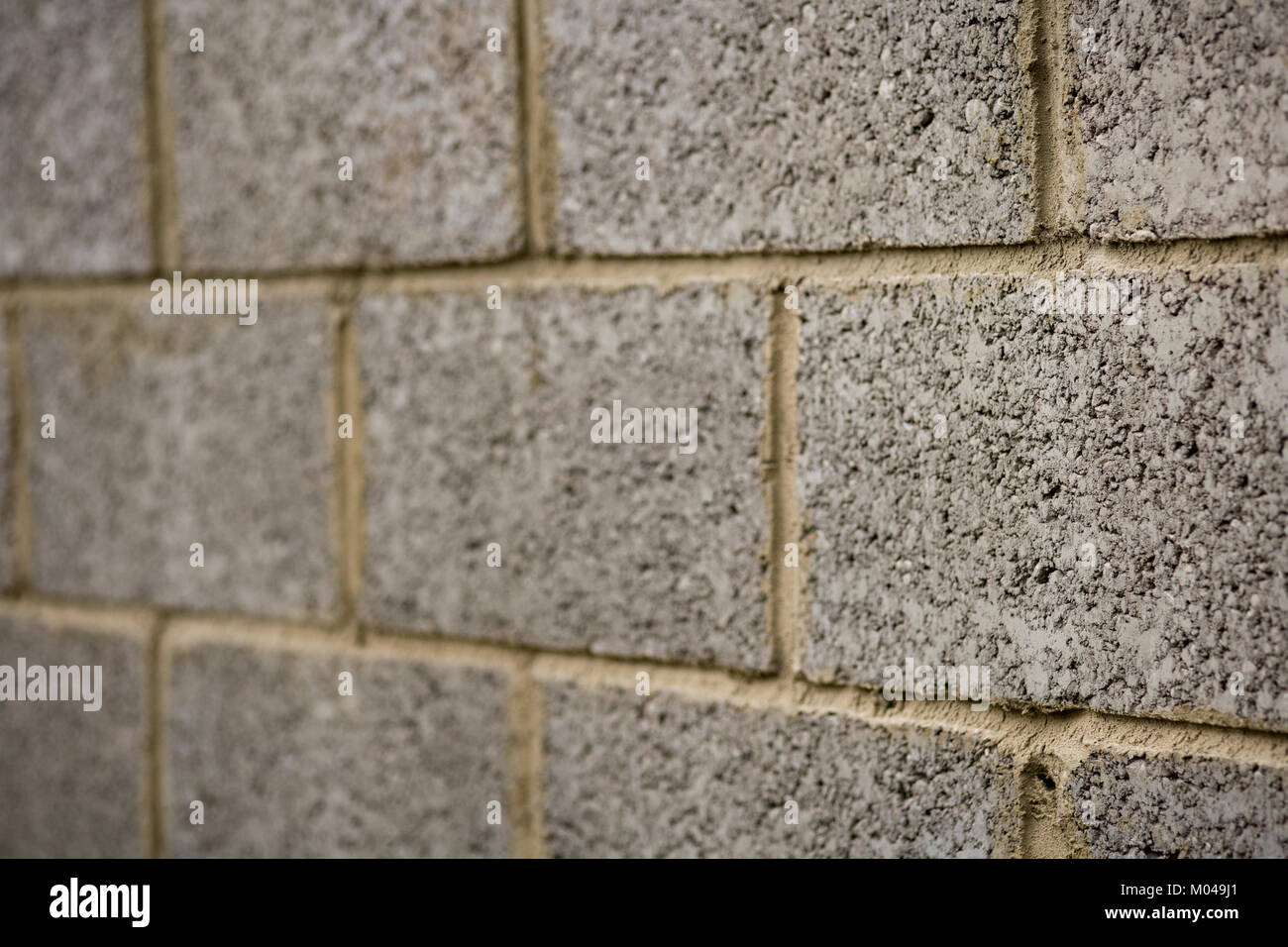 Newly made concrete block wall, differential focus Stock Photo