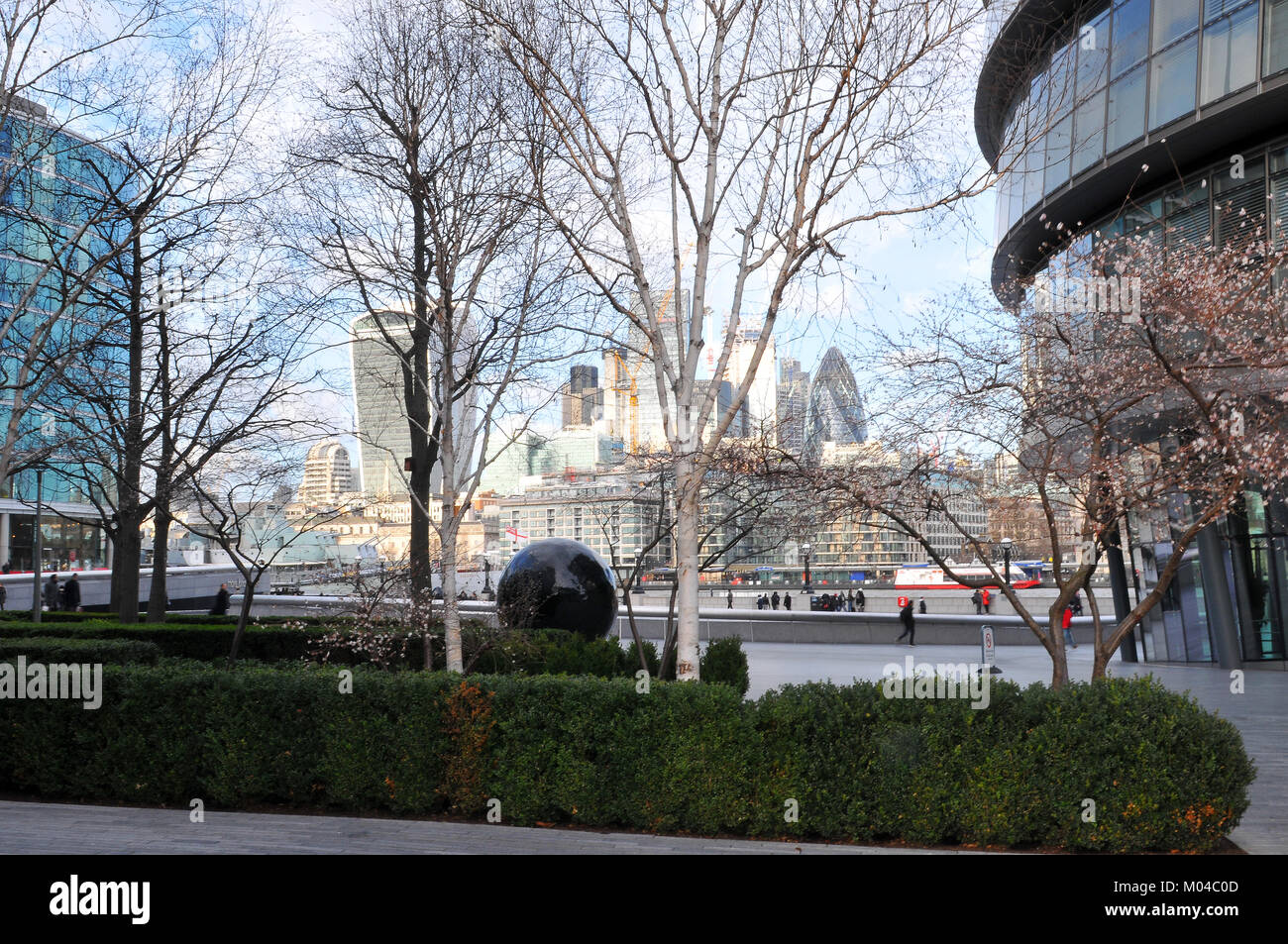 Blossom trees in early spring at more london place with offices and