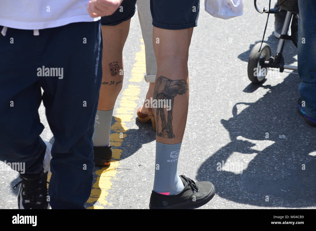 a star wars AT-AT tattoo on a man's leg brooklyn new york USA Stock Photo