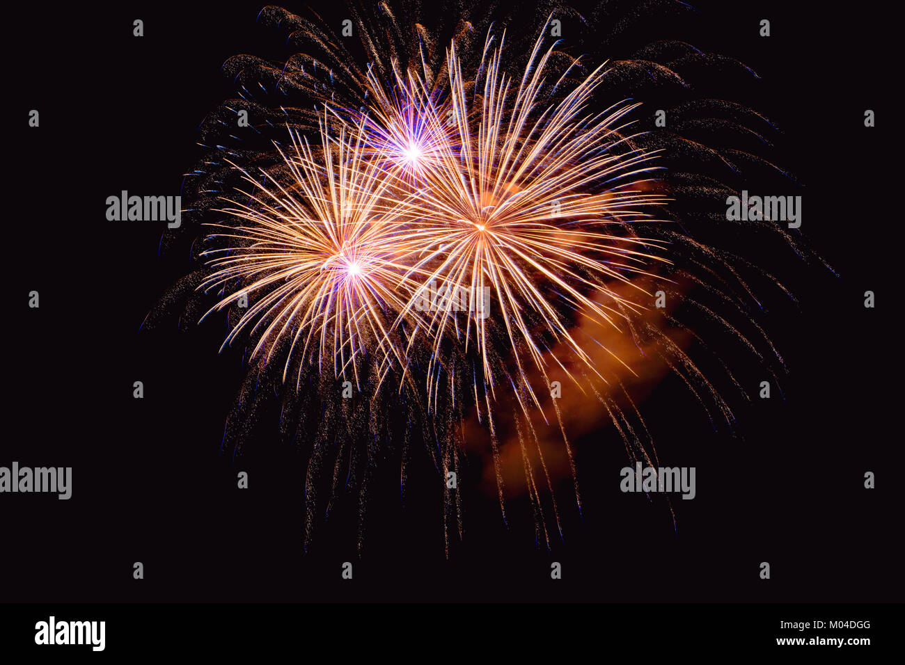 Colorful firework on the night sky. New Year celebration fireworks. Abstract firework isolated on the transition of blue and black background with fre Stock Photo