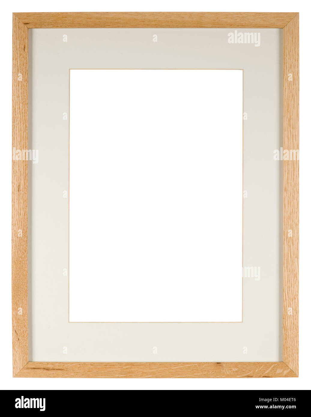 Empty picture frame of light oak wood with a mount Stock Photo