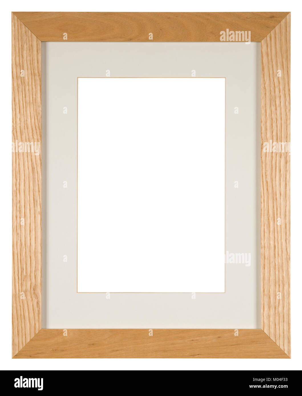 Empty picture frame isolated on white, portrait format with mount in light oak wood Stock Photo