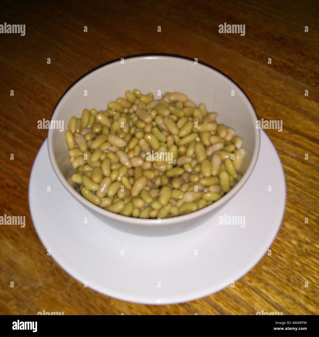Canned flageolets are a type of pre-cooked beans packed in cans for ...