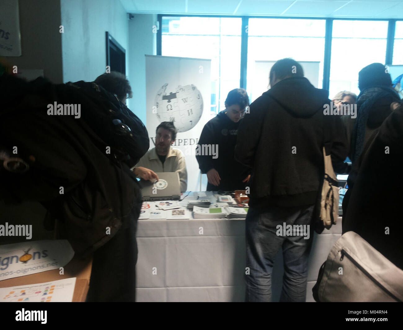 An image from FOSDEM 2015, an annual free and open-source software development event held in Brussels. The conference brings together developers, enthusiasts, and professionals in the software industry. Stock Photo