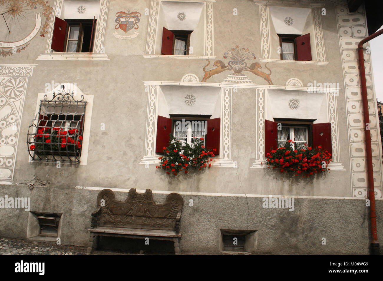 Beautifully ornamented windows in the village of Guarda, Switzerland Stock Photo