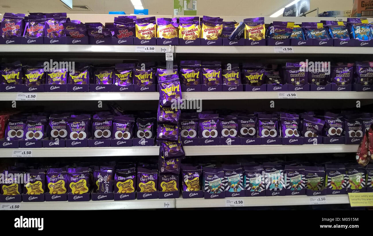 Cadbury Buttons are a popular chocolate confection produced by the Cadbury company. Known for their smooth texture and iconic round shape, they have been a favorite among chocolate lovers for generations. Stock Photo
