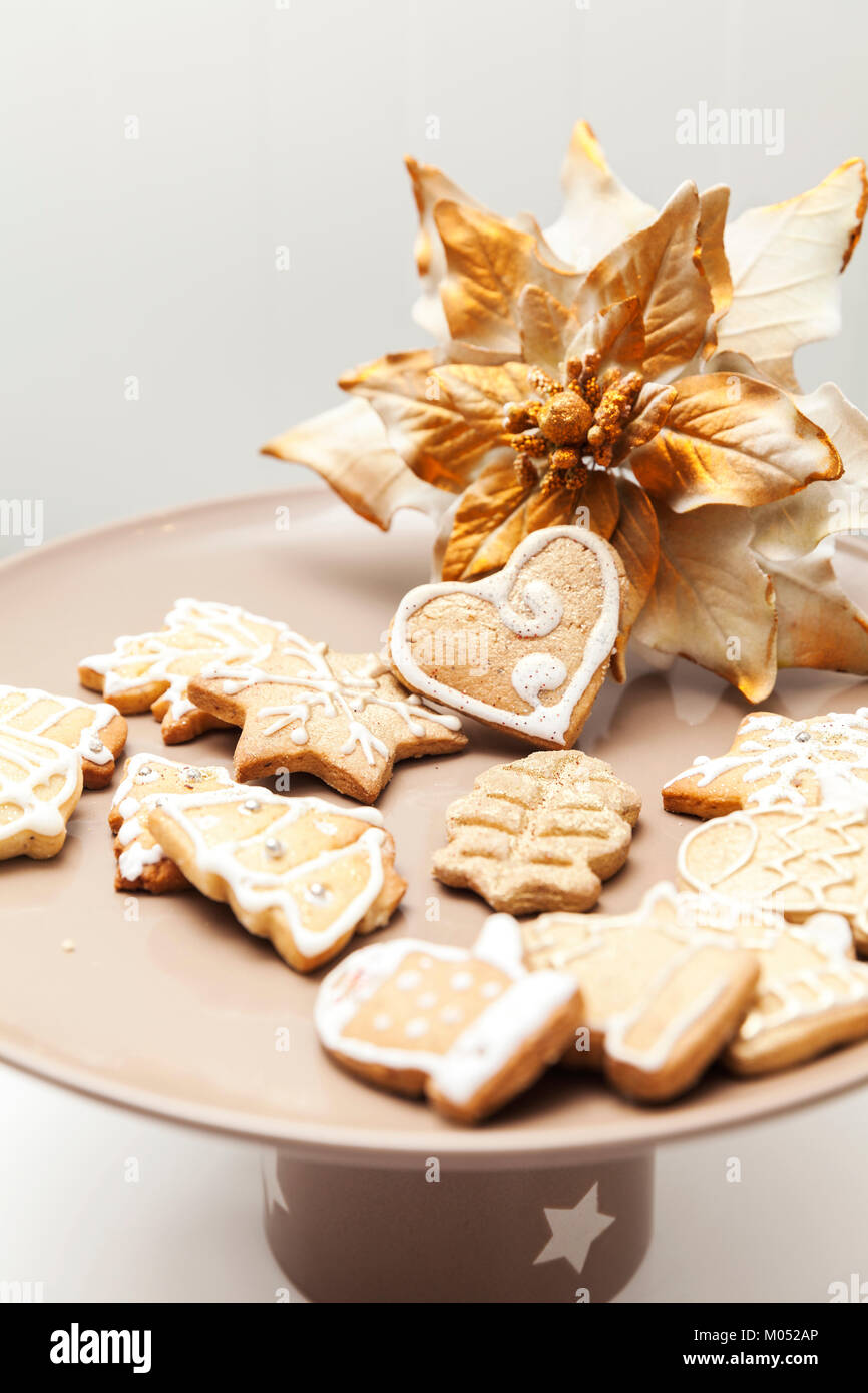 gingerbread cookies on a plate with Christmas motifs, close up Stock Photo