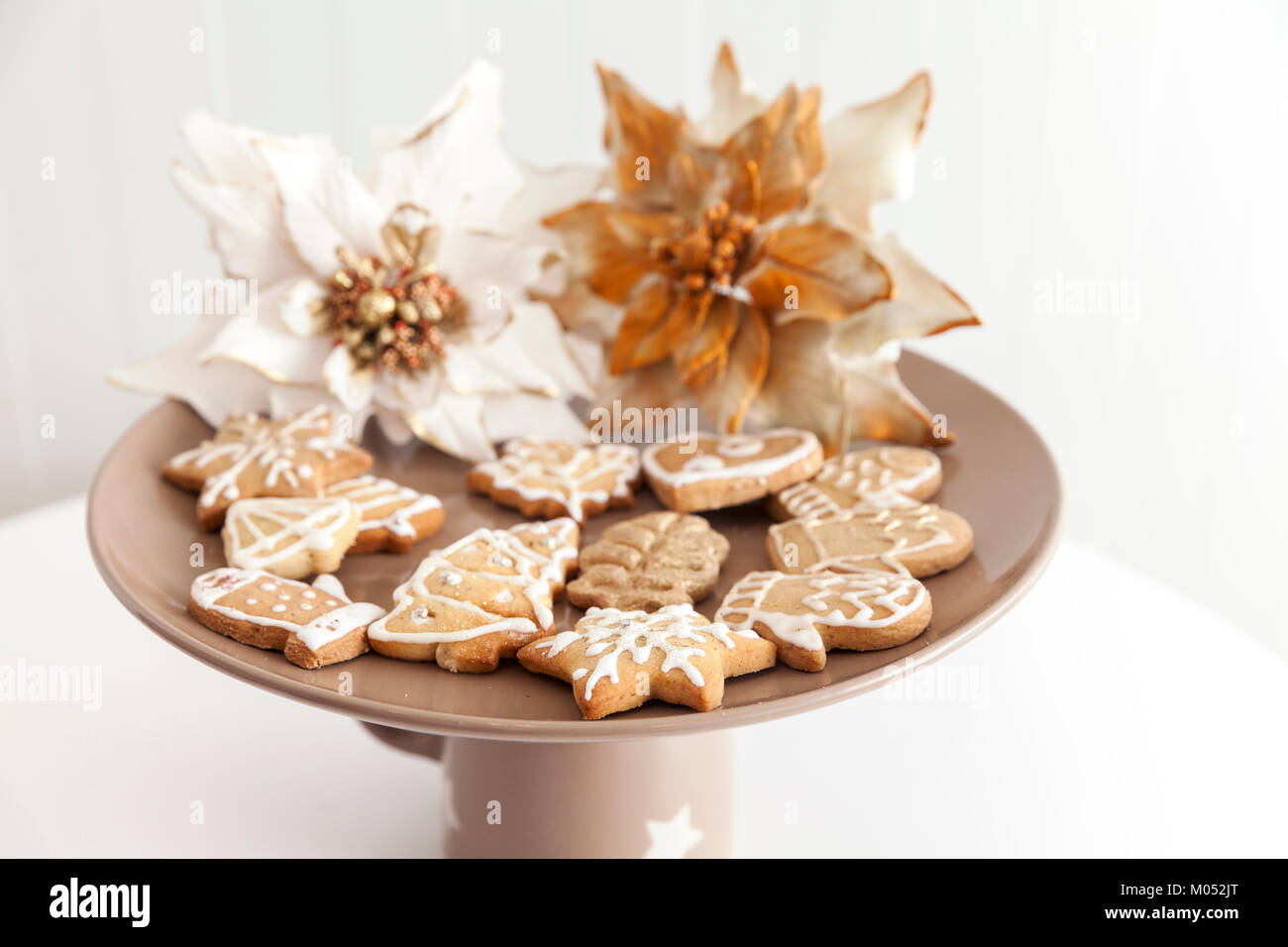 gingerbread cookies on a plate with Christmas motifs, close up Stock Photo