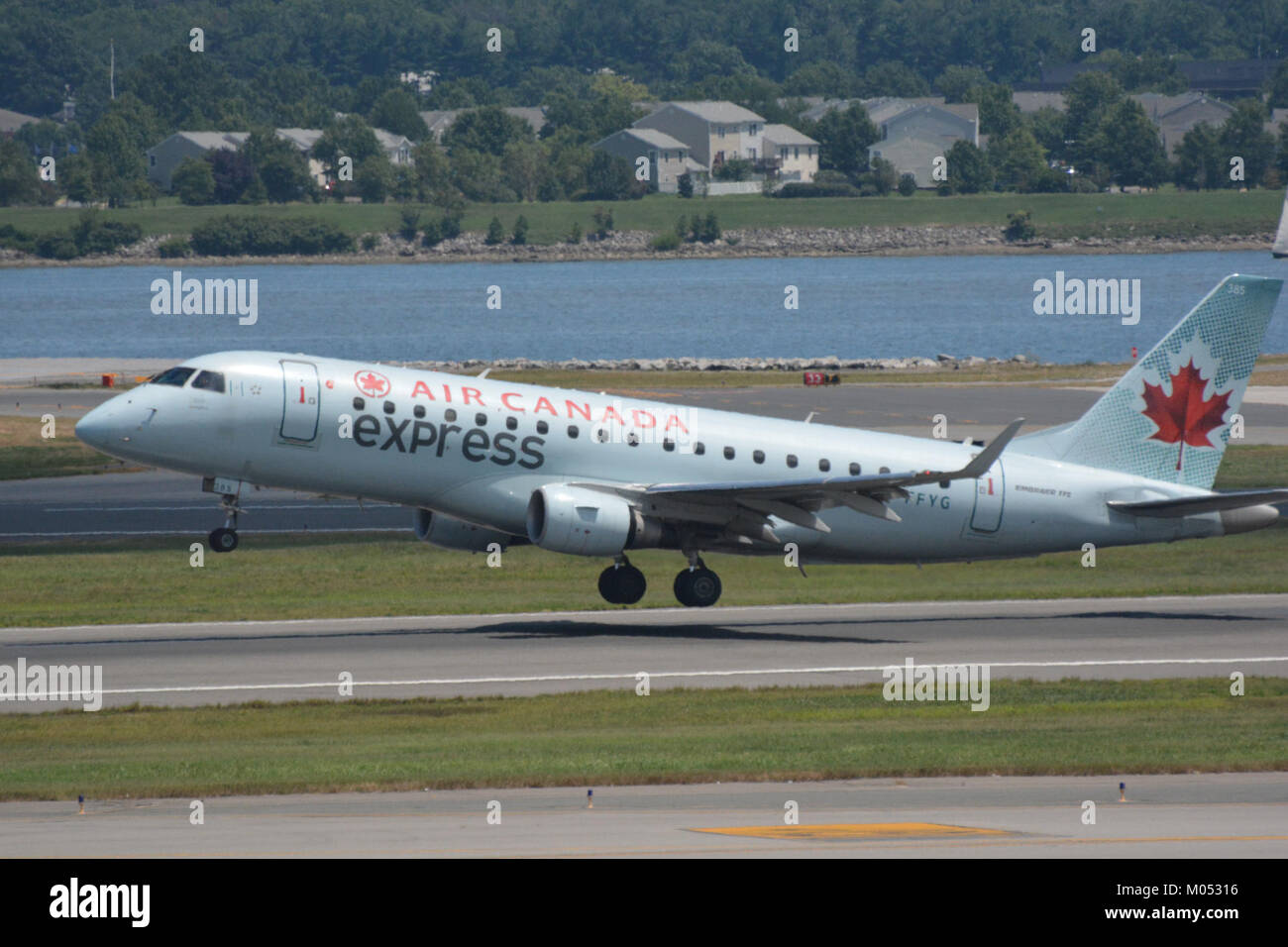C-FFYG, a specific aircraft, was photographed at Washington D.C.'s National Airport (DCA). The image captures the aircraft in its operational context, highlighting its presence at a prominent airport. The aircraft type and airline information can be inferred from the image, showcasing aviation history and the importance of airports in global transportation. Stock Photo