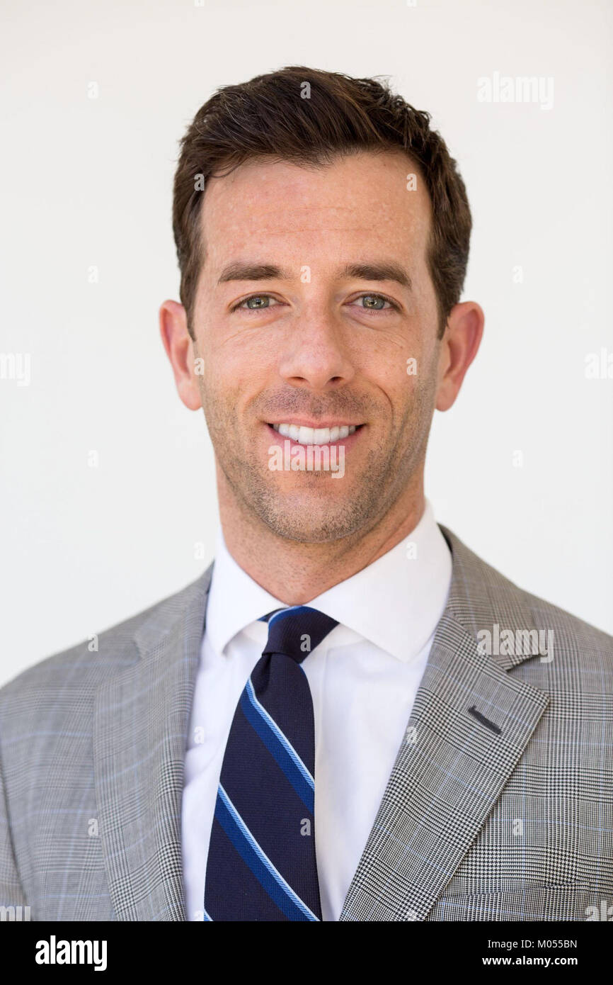 This is an official portrait of Brian Mosteller, a well-known individual in his professional field, typically used for public or media appearances. The photograph captures his formal appearance, meant for official representation. Stock Photo