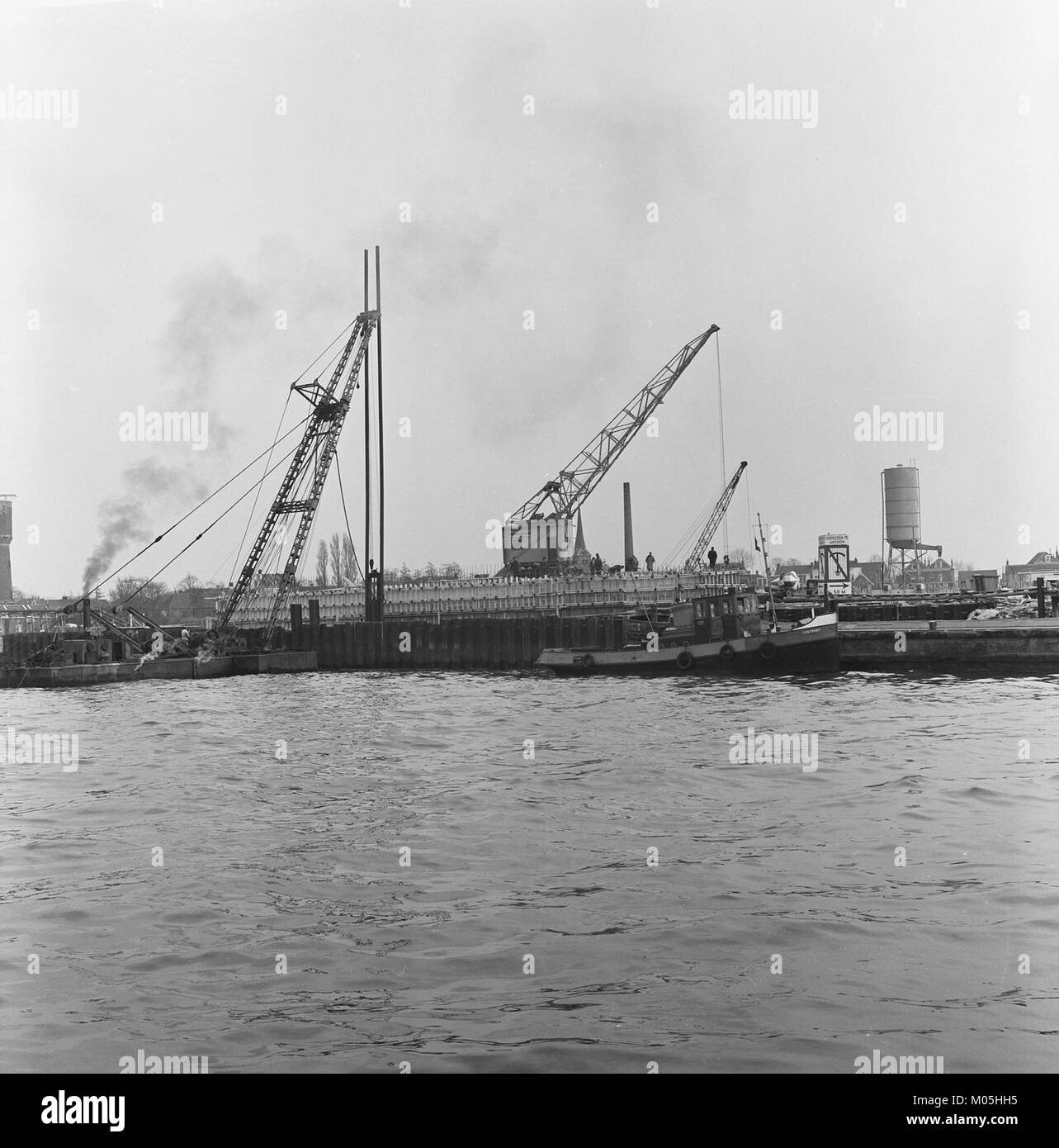 This image shows the construction of the largest bridge in the country at Brienenoord. The photo captures the progress of the bridge-building project in the Netherlands. Stock Photo