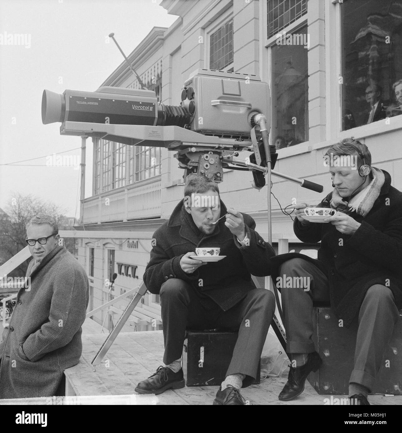 The image depicts cameramen taking a break during a film or television(02)