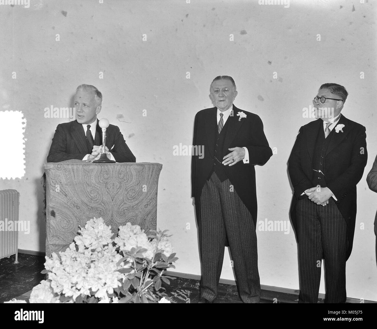 A historical image depicting the opening of the new Simplex factory in ...