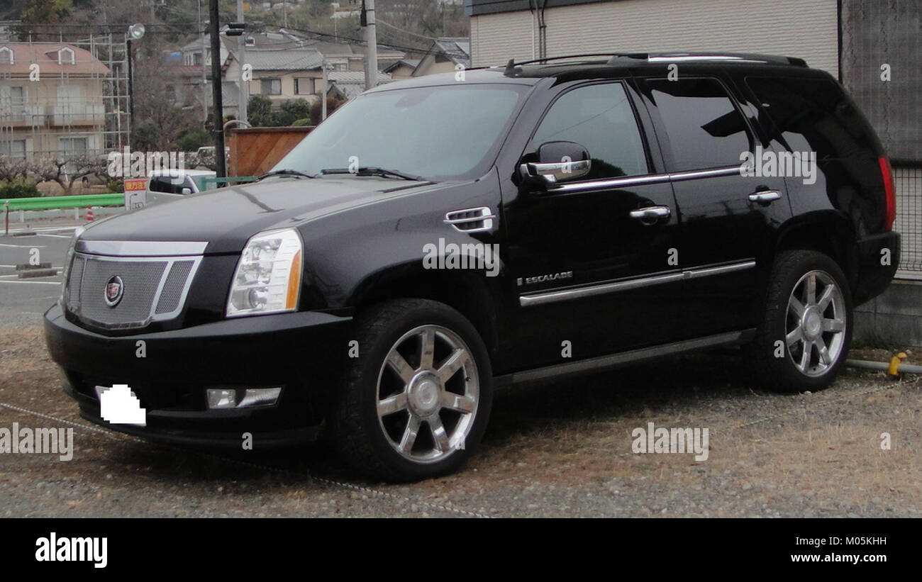The Cadillac Escalade TX is a luxury SUV designed for high performance and comfort. Known for its powerful engine and upscale features, it continues to be a prominent vehicle in the luxury SUV market. Stock Photo