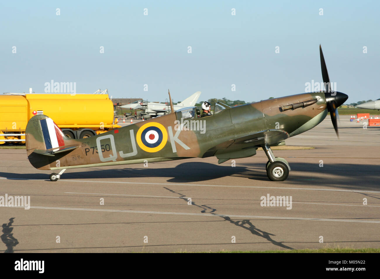 The RAF Battle of Britain Memorial Flights veteran Spitfire Mk IIa taxiing out on a summers evening at RAF Coningsby for a memorial flypast. Stock Photo