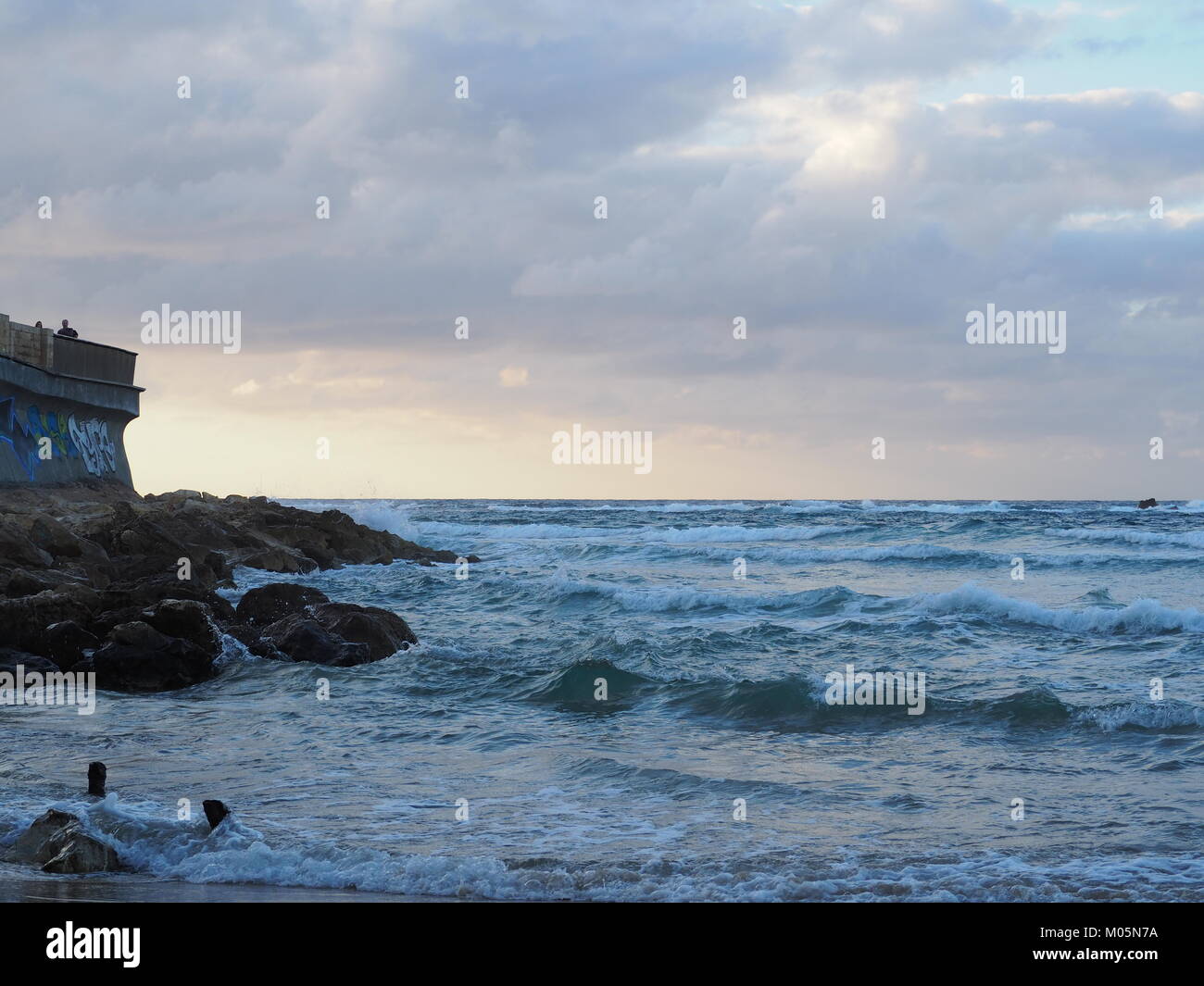 breaking waves on the coast rocks Stock Photo - Alamy
