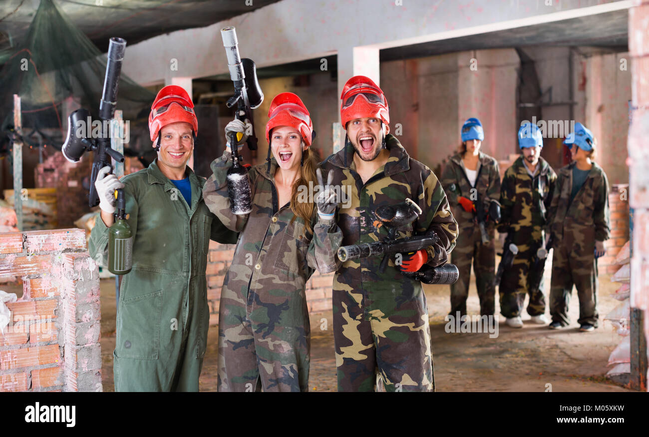 Team is enjoying the victory at the paintball club Stock Photo