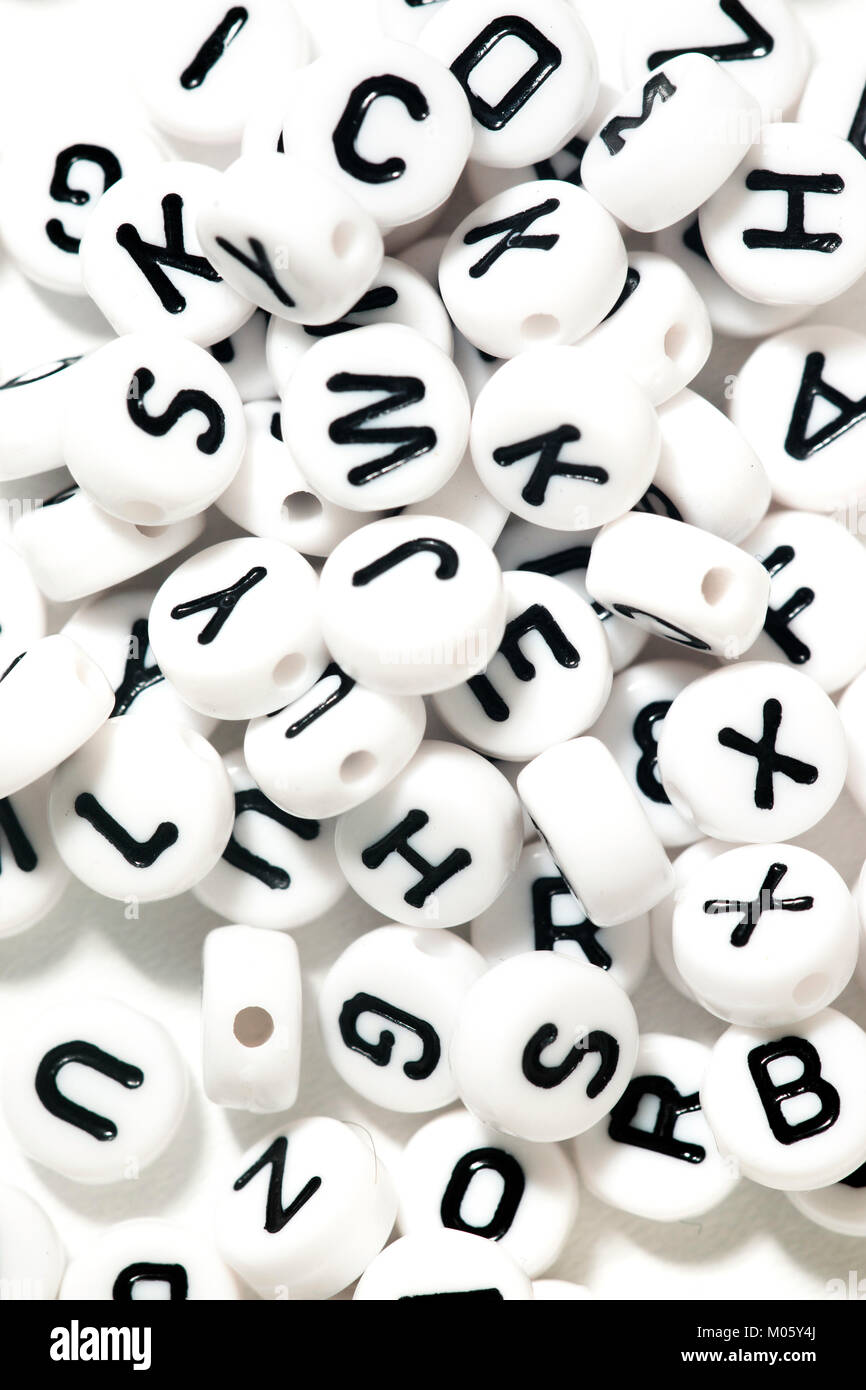 Plastic Beads Alphabet Isolated On A White Background Stock Photo -  Download Image Now - iStock