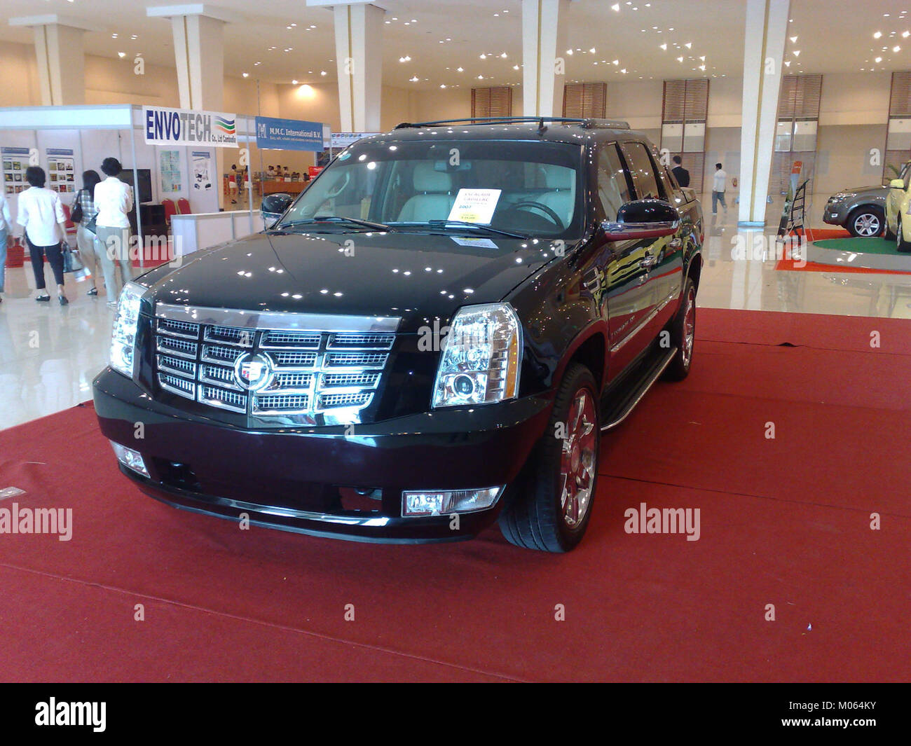 A photograph of the Cadillac Escalade, an iconic luxury SUV, showcasing its design and features. The model, captured in 2011, represents Cadillac's high-end vehicle line. Stock Photo