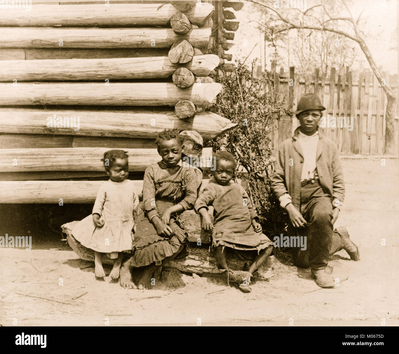 African American man and three children Stock Photo - Alamy