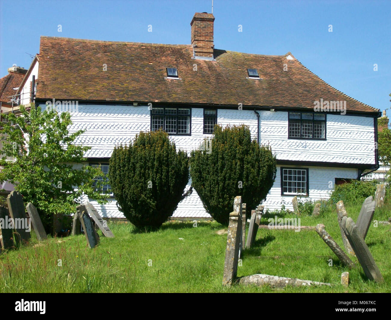 Brenchley, house by churchyard Stock Photo Alamy