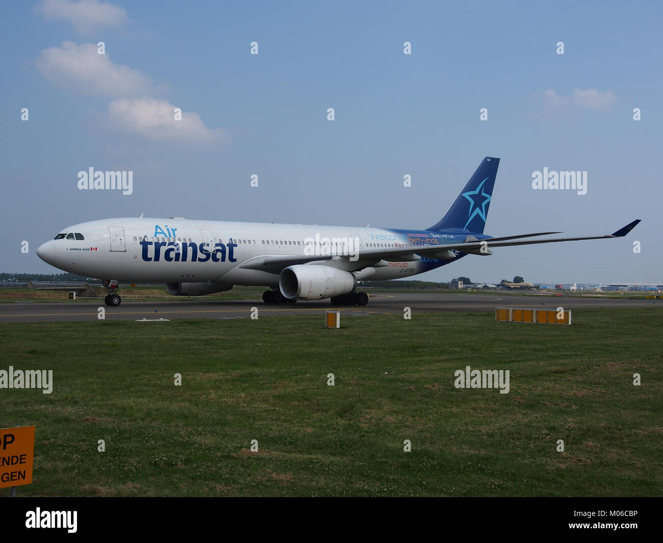 An image of the C-GTSN Air Transat Airbus A330-243, showcasing the aircraft in flight. This aircraft represents modern aviation technology and is part of Air Transat's fleet. Stock Photo