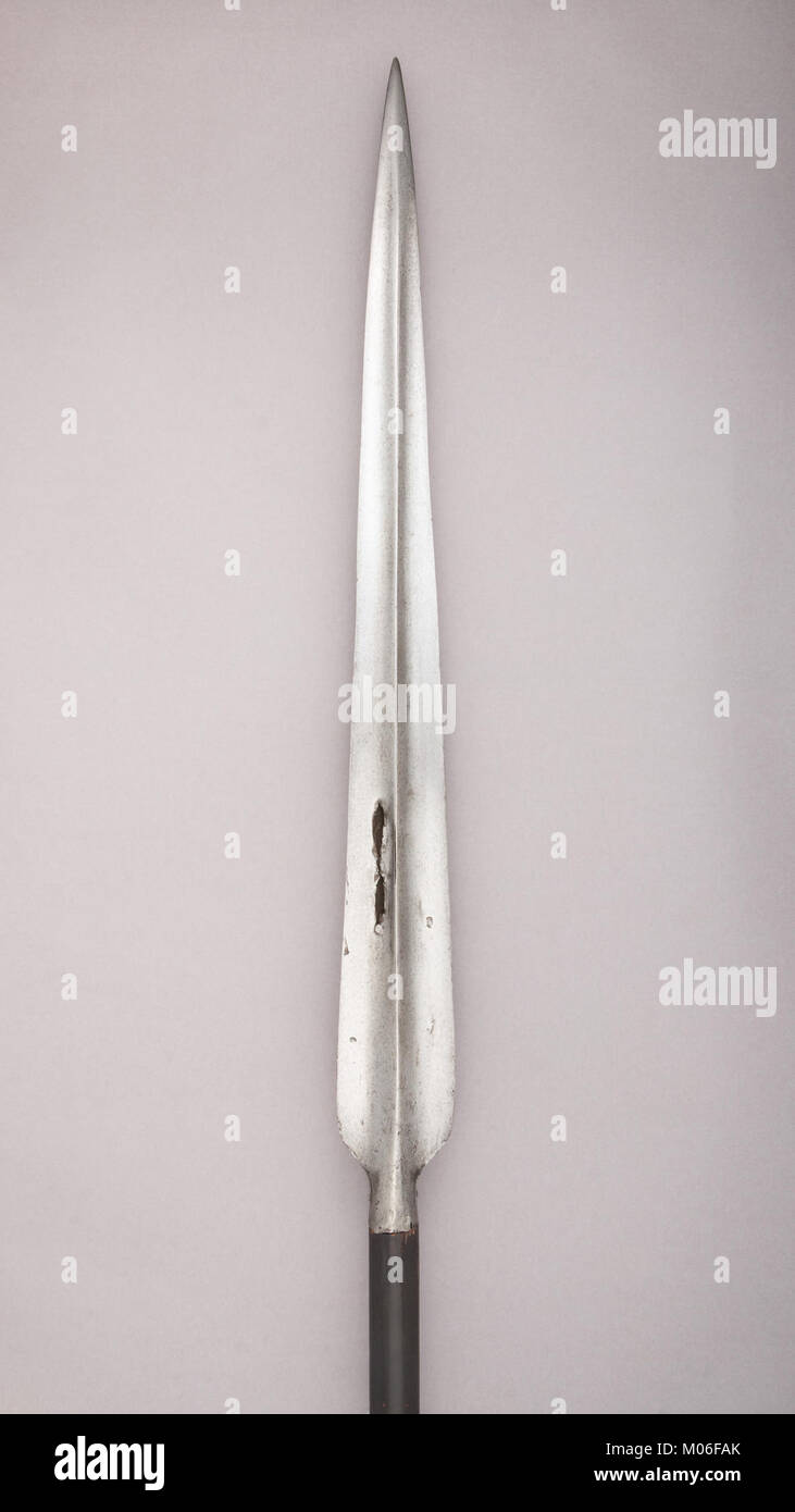 This lance is a historical weapon, featuring detailed metalwork and ...