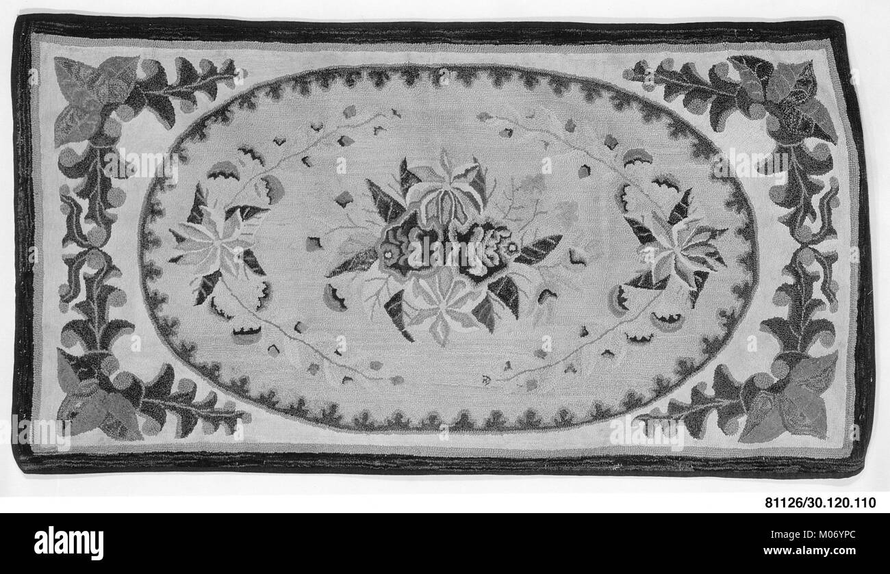 A decorative hooked rug from the 19th century, showcasing intricate ...