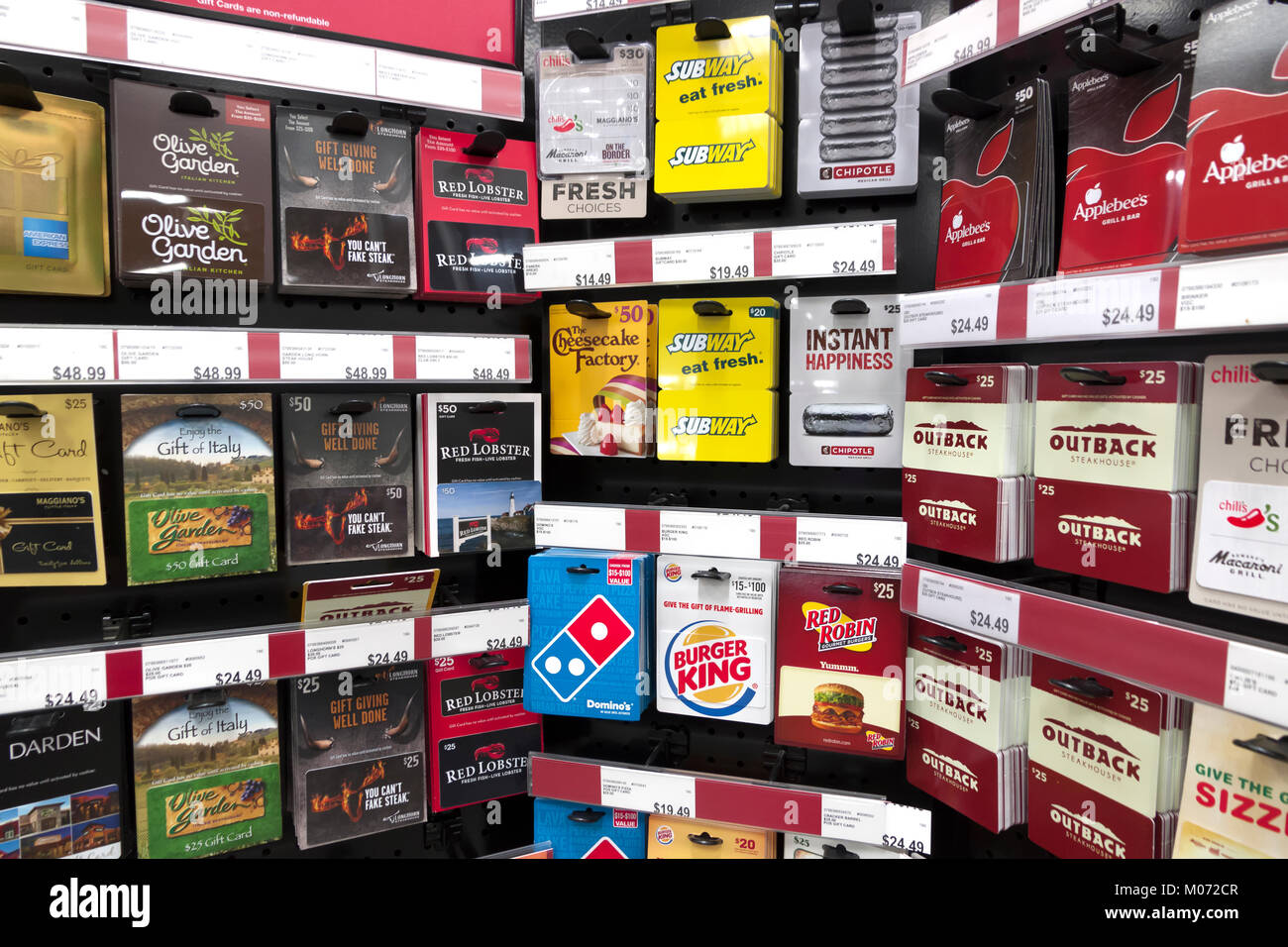Restaurant gift cards for sale on a store display. Stock Photo