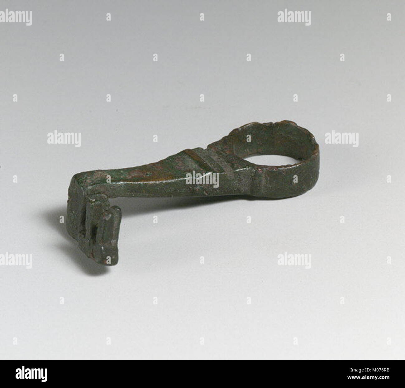 This key, an antique metal object, was used for opening locks and ...