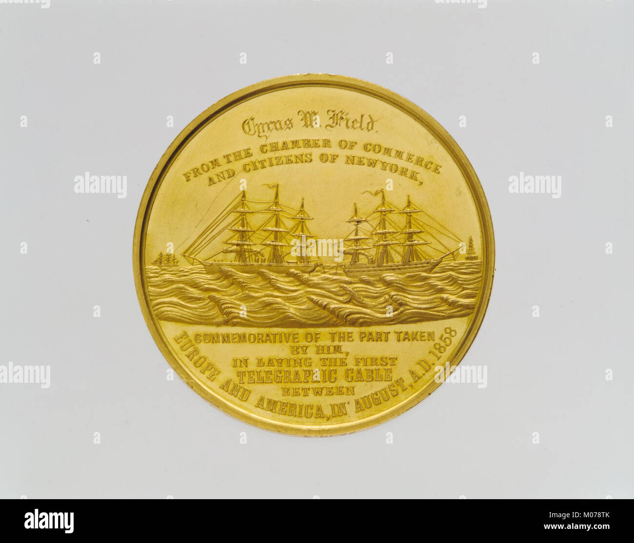 This metal medal is a historical commemorative object used to honor ...