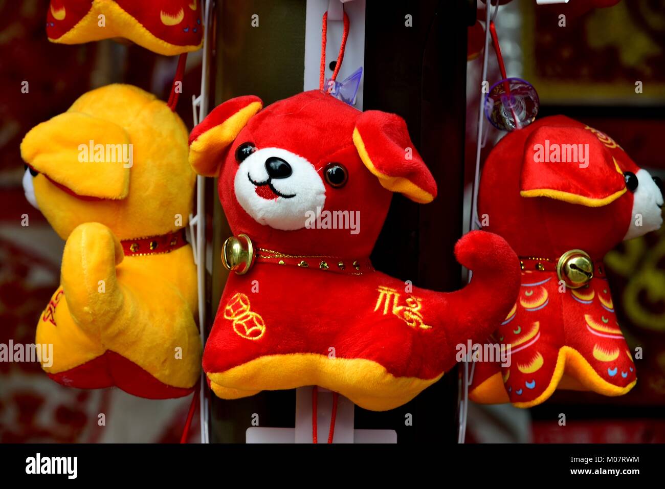Toy dogs on sale in Chinatown during Lunar New Year in Singapore Stock