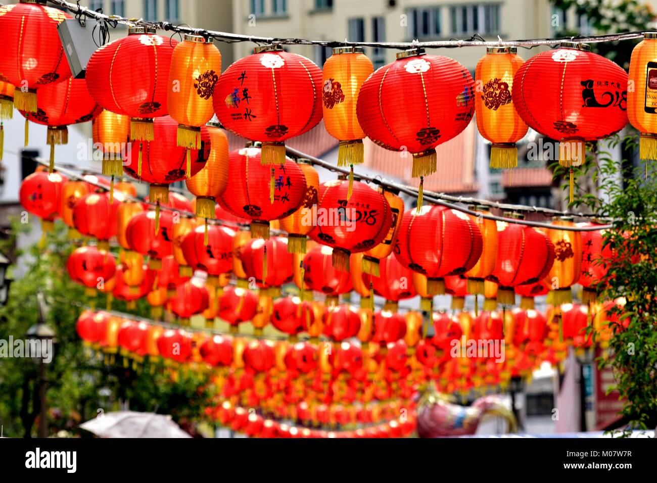 Red Chinese lanterns hanging across a street in historic Chinatown,  Singapore celebrating the Chinese New Year festival Stock Photo - Alamy