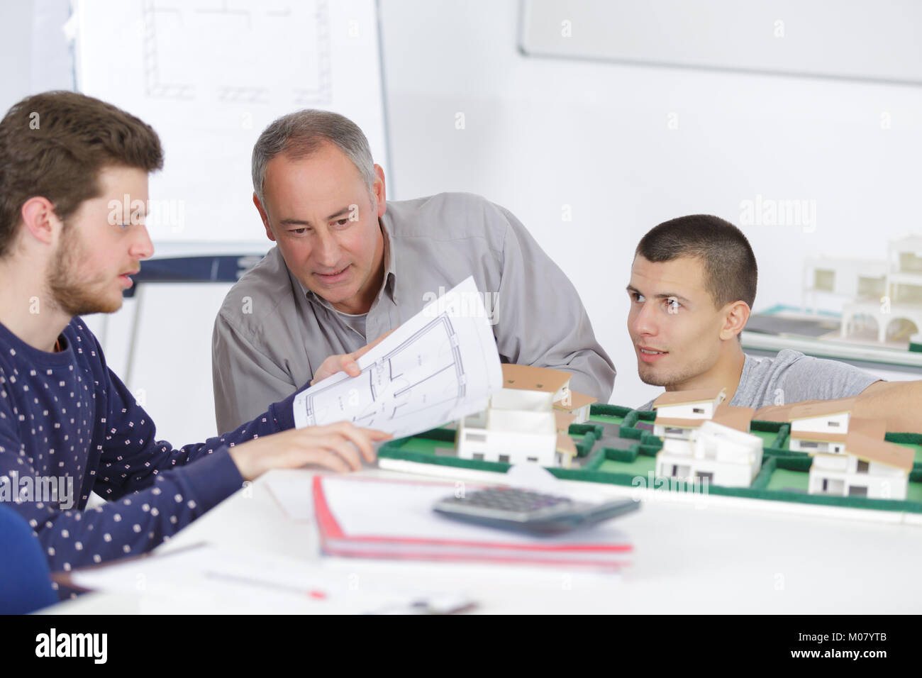 teacher with students in architecture school Stock Photo - Alamy