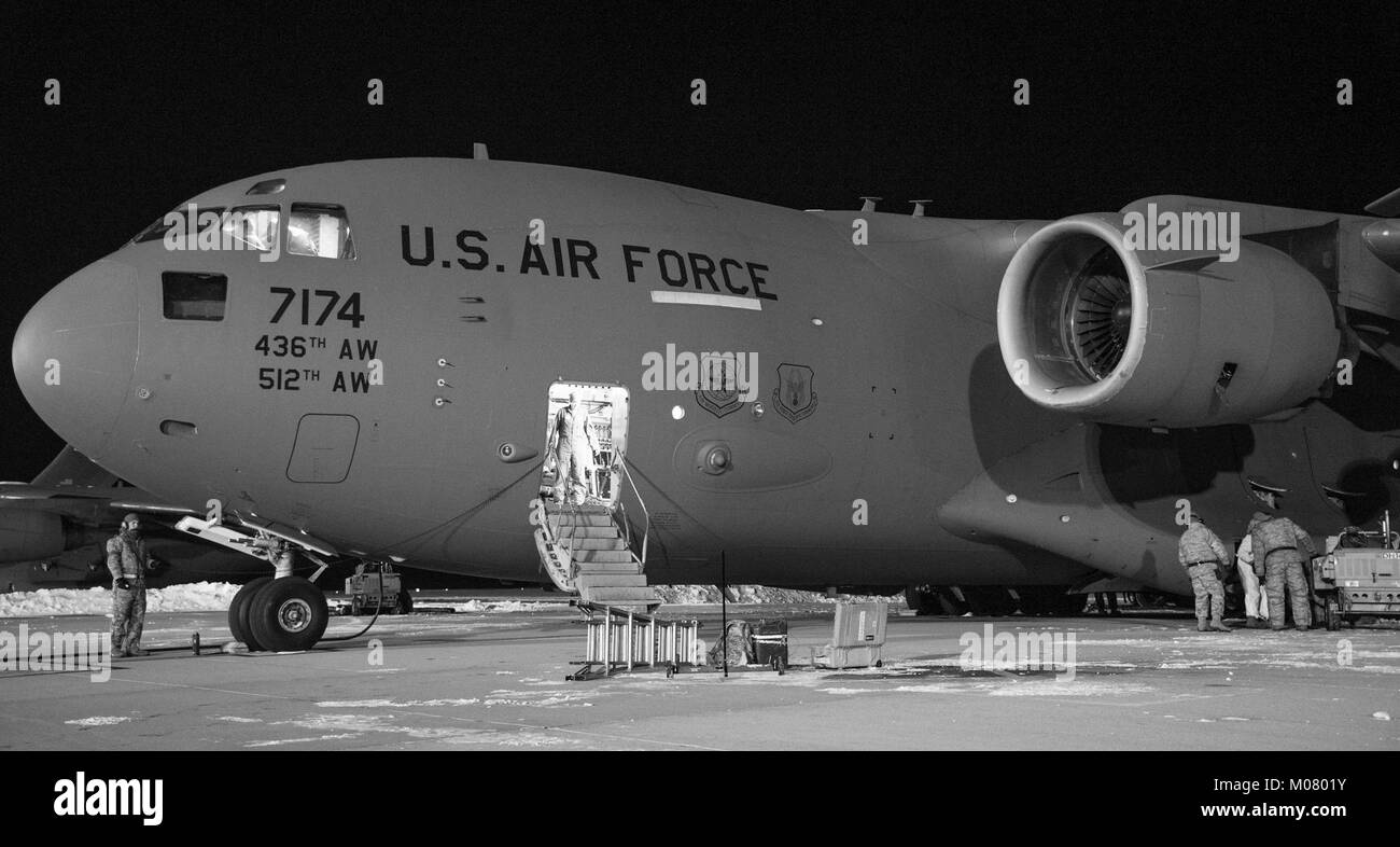 Maintenance personnel from the 736th Aircraft Maintenance Squadron prepare to launch a C-17A Globemaster III, Jan. 5, 2018, at Dover Air Force Base, Del. The maintainers prepared the aircraft for a mission in temperatures in the low teens with a wind chill hovering around minus three degrees. (U.S. Air Force Stock Photo