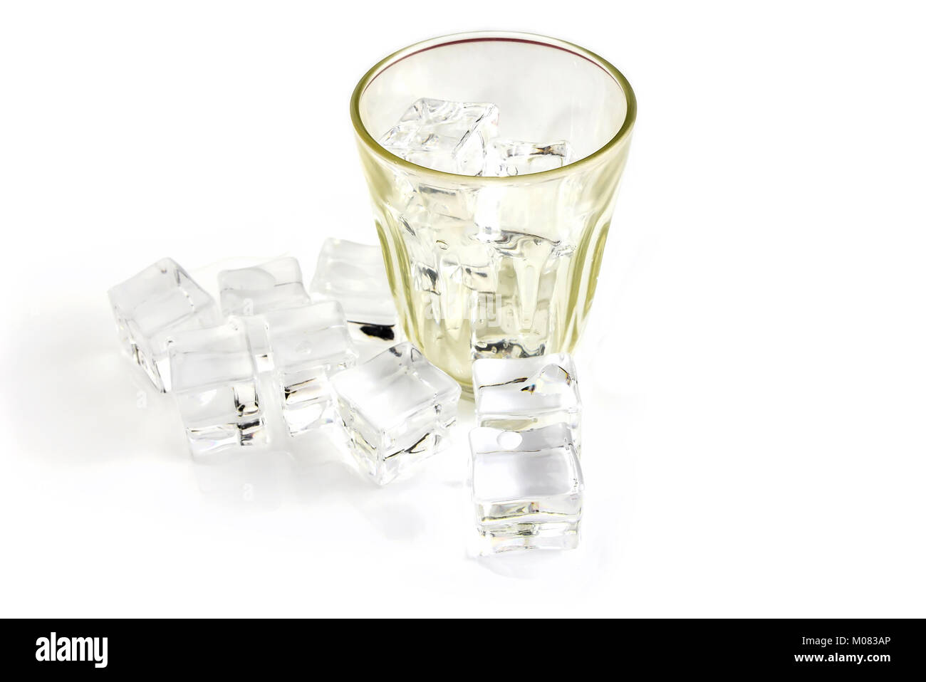 Ice cubes and glass isolated on white background Stock Photo - Alamy
