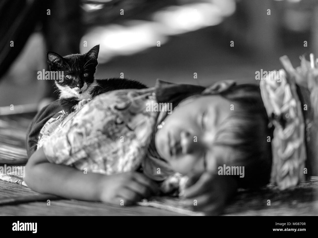 Portrait of long neck tribal girl sleeping in her village, Thailand Stock Photo