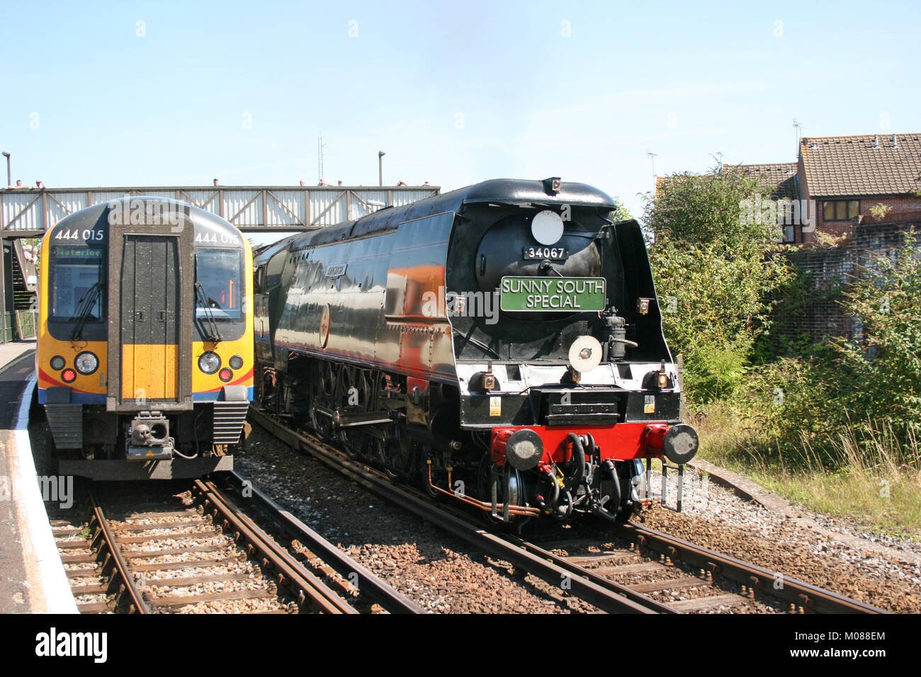 Battle of Britain class steam locomotive No. 34067 Tangmere on the Sunny South Special from Dorchester South to Weymouth 19th August 2009 - Dorchester Stock Photo