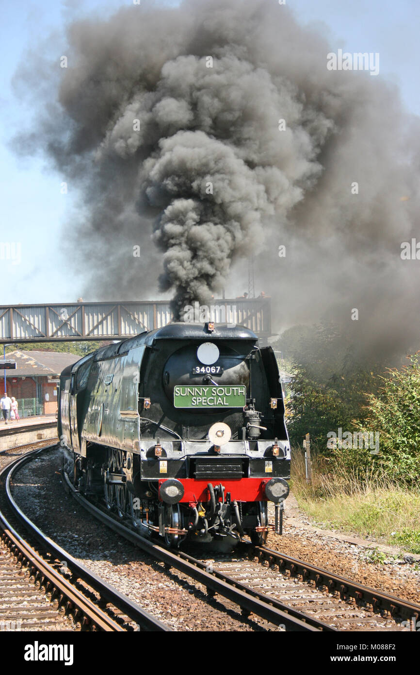 Battle of Britain class steam locomotive No. 34067 Tangmere on the Sunny South Special from Dorchester South to Weymouth 19th August 2009 - Dorchester Stock Photo