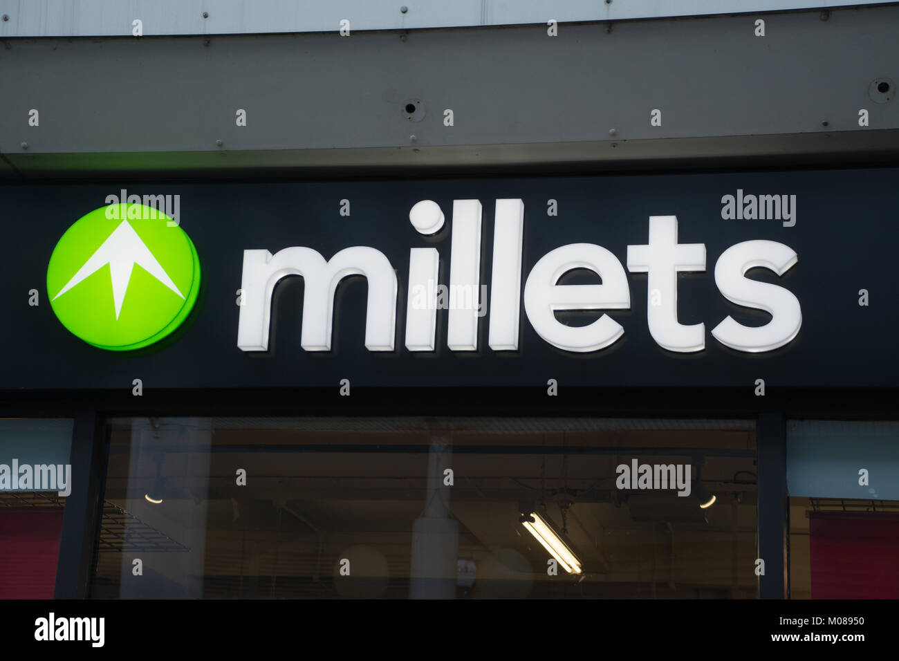 Millets outdoor clothing shop sign or logo, UK Stock Photo