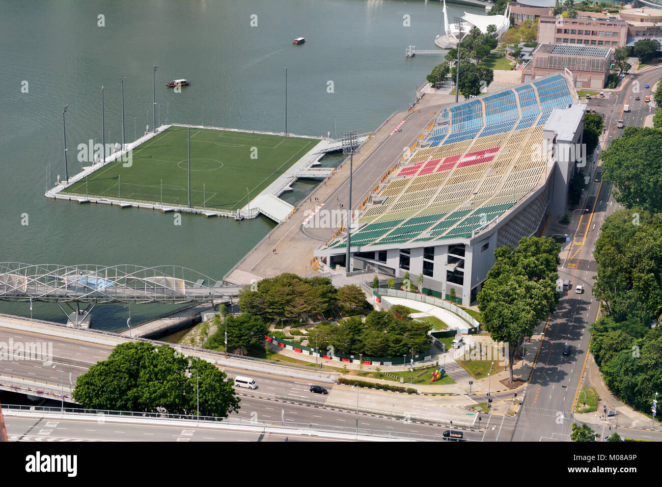 Singapore, Singapore - December 11, 2017. View over the Float at Marina Bay stadium and stage in Singapore, with surrounding buildings and city traffi Stock Photo