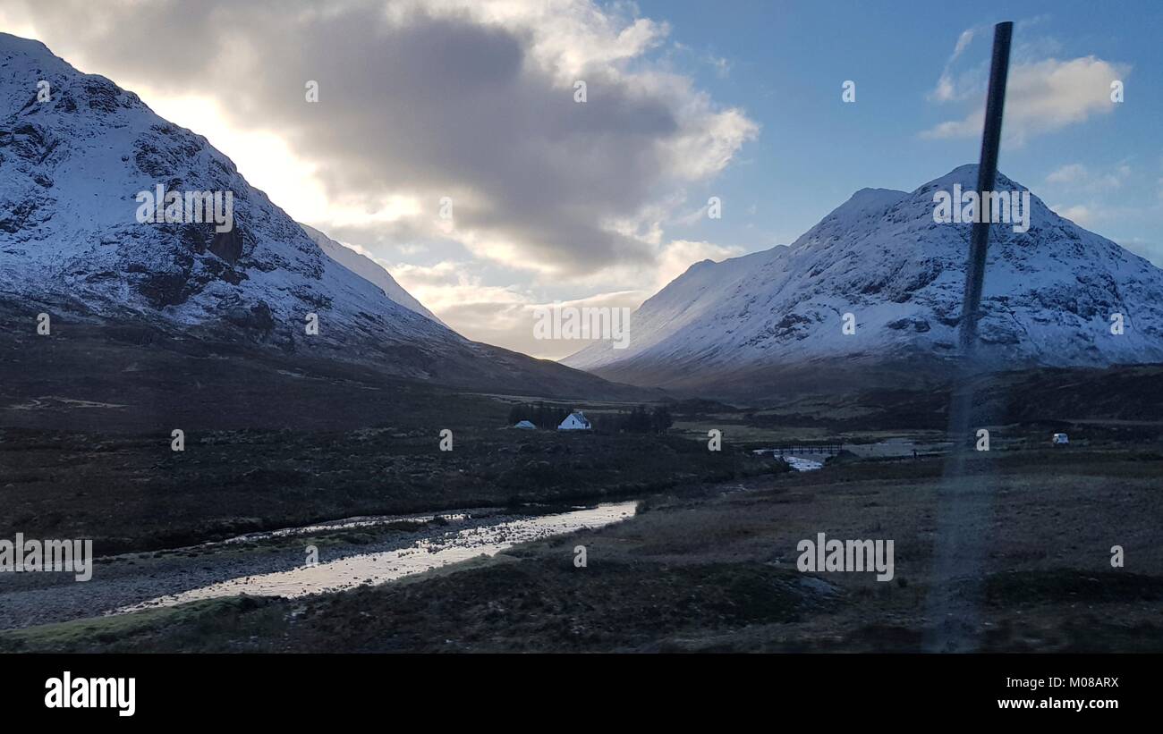 Views of Glencoe mountain range - home to the oldest ski area in the British Islands. In winter the area is a magnet for walkers, climbers and skiers. The weather patterns mean that a deceptively sunny day can quickly deteriorate often cause problems for the unwary. Stock Photo