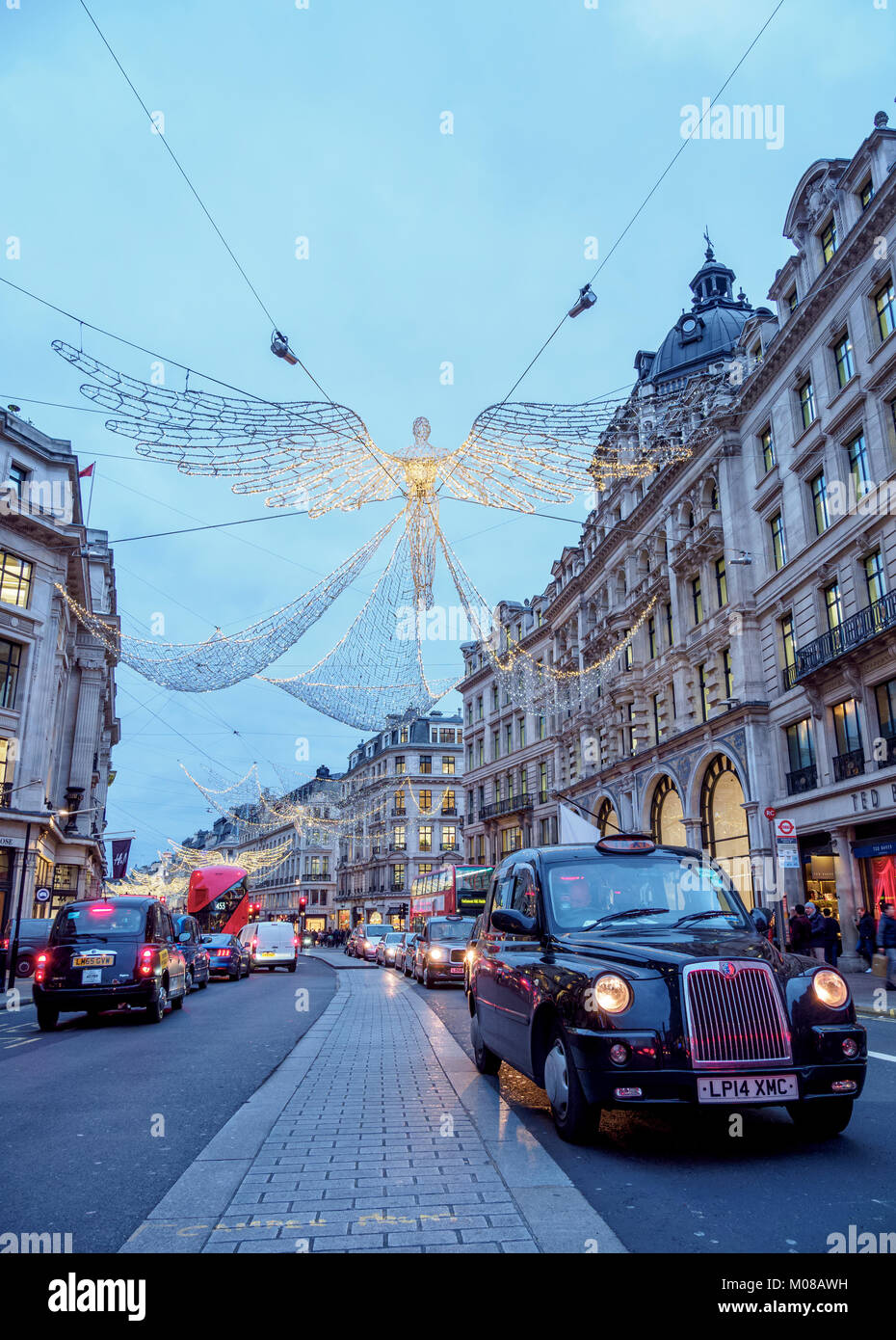 Regent Street with Christmas Illuminations at twilight, London, England, United Kingdom Stock Photo