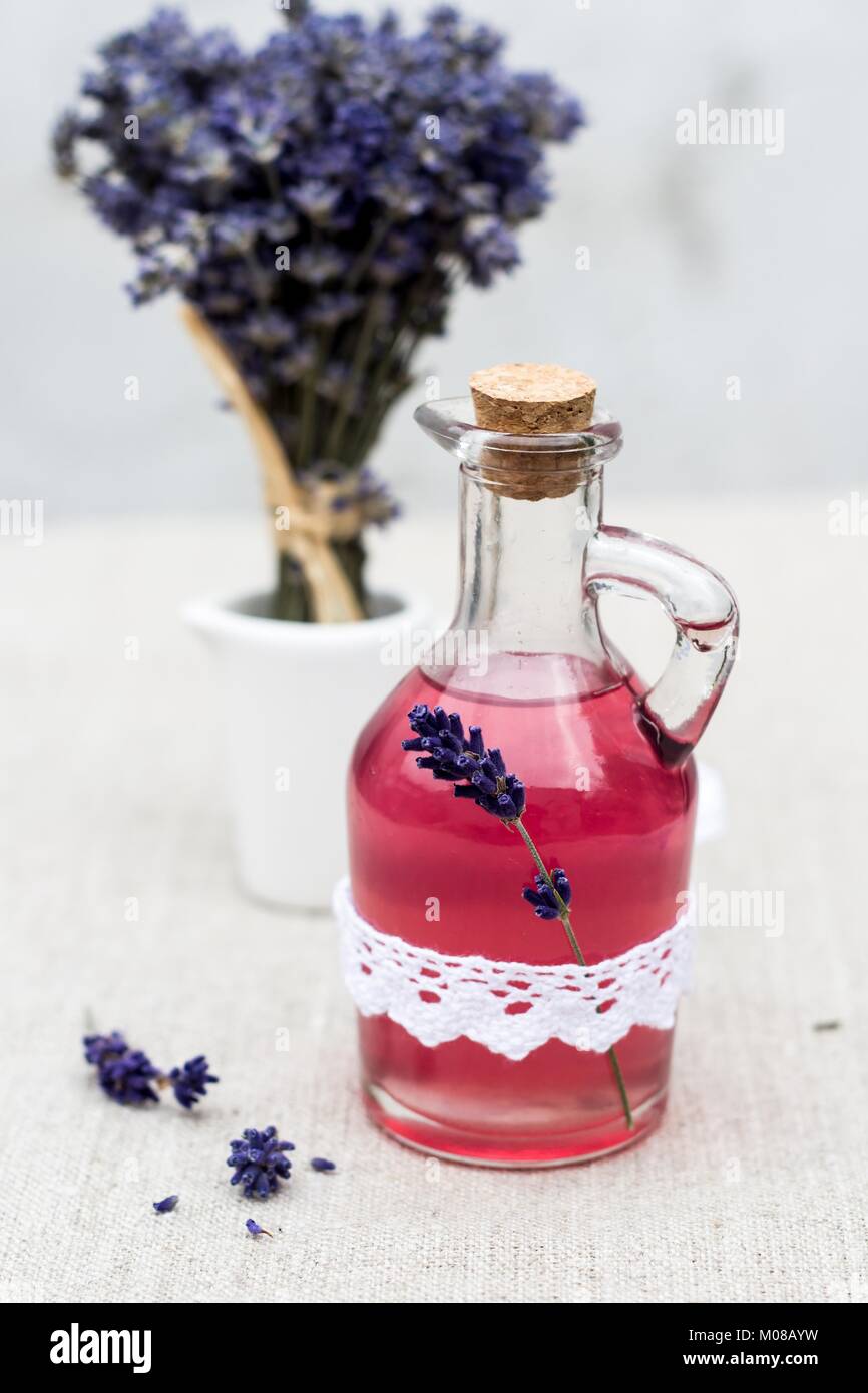 lavender syrup and flowers of lavender - natural medicine Stock Photo