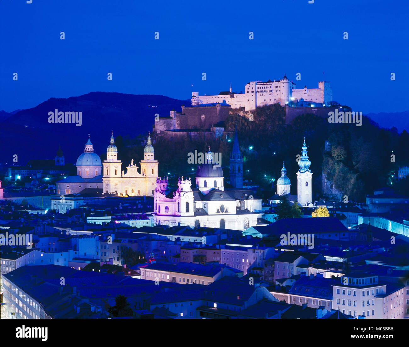 Spires and domes of Salzburg, overlooked by the Hohenzollern Castle, Salzburg, Austria Stock Photo