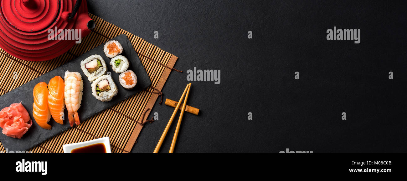 Sushi board - assorted nigiri, futomaki, hosomaki food Poster
