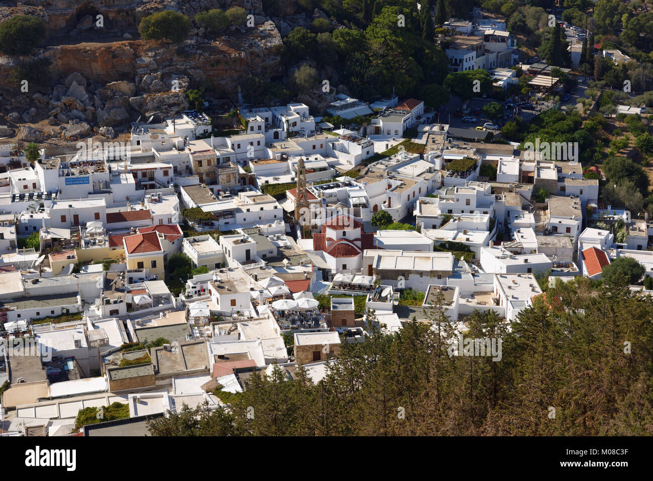Lindos, Greece - October 11, 2017: Aerial view of Lindos from Acropolis. Located 50 km south of the town of Rhodes, Lindos is a popular tourist and ho Stock Photo