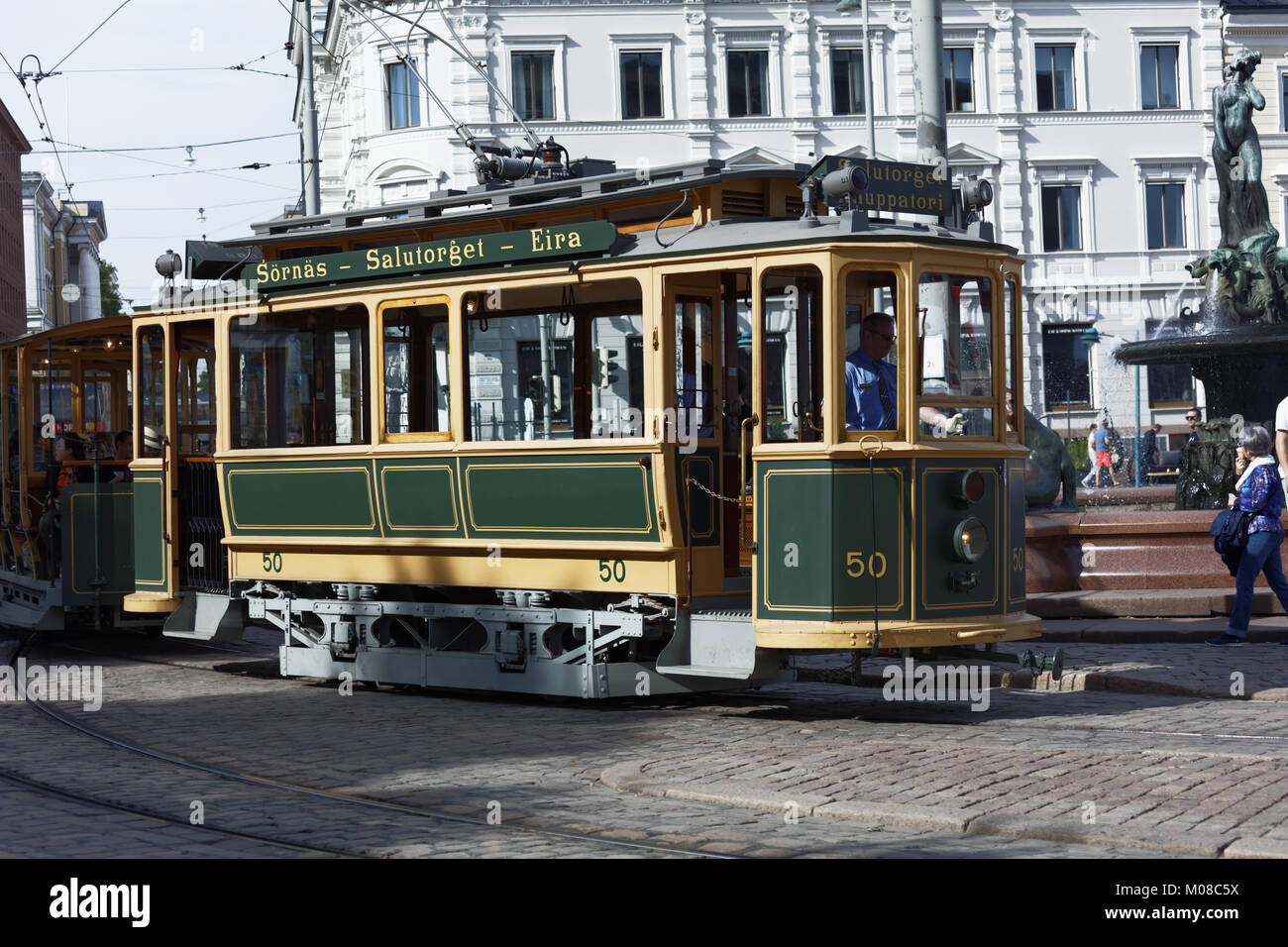 Helsinki, Finland - July 29, 2017: Retro tram on Kauppatori, Market Square in a summer day. The car made in 1909 is now used as sightseeing tram route Stock Photo