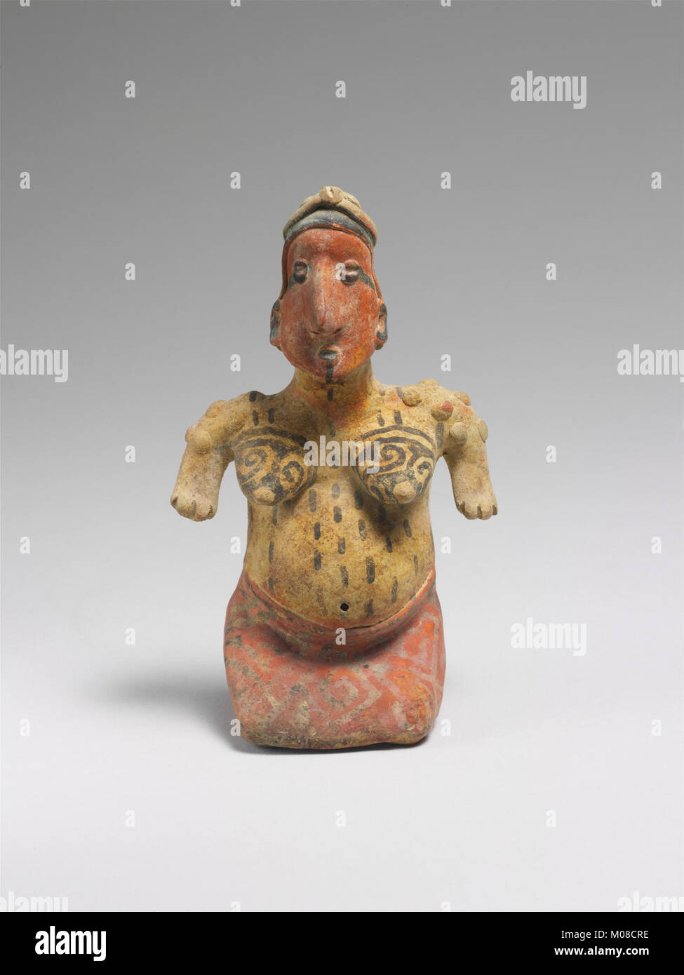 This kneeling female figure exemplifies traditional posture, sculptural ...