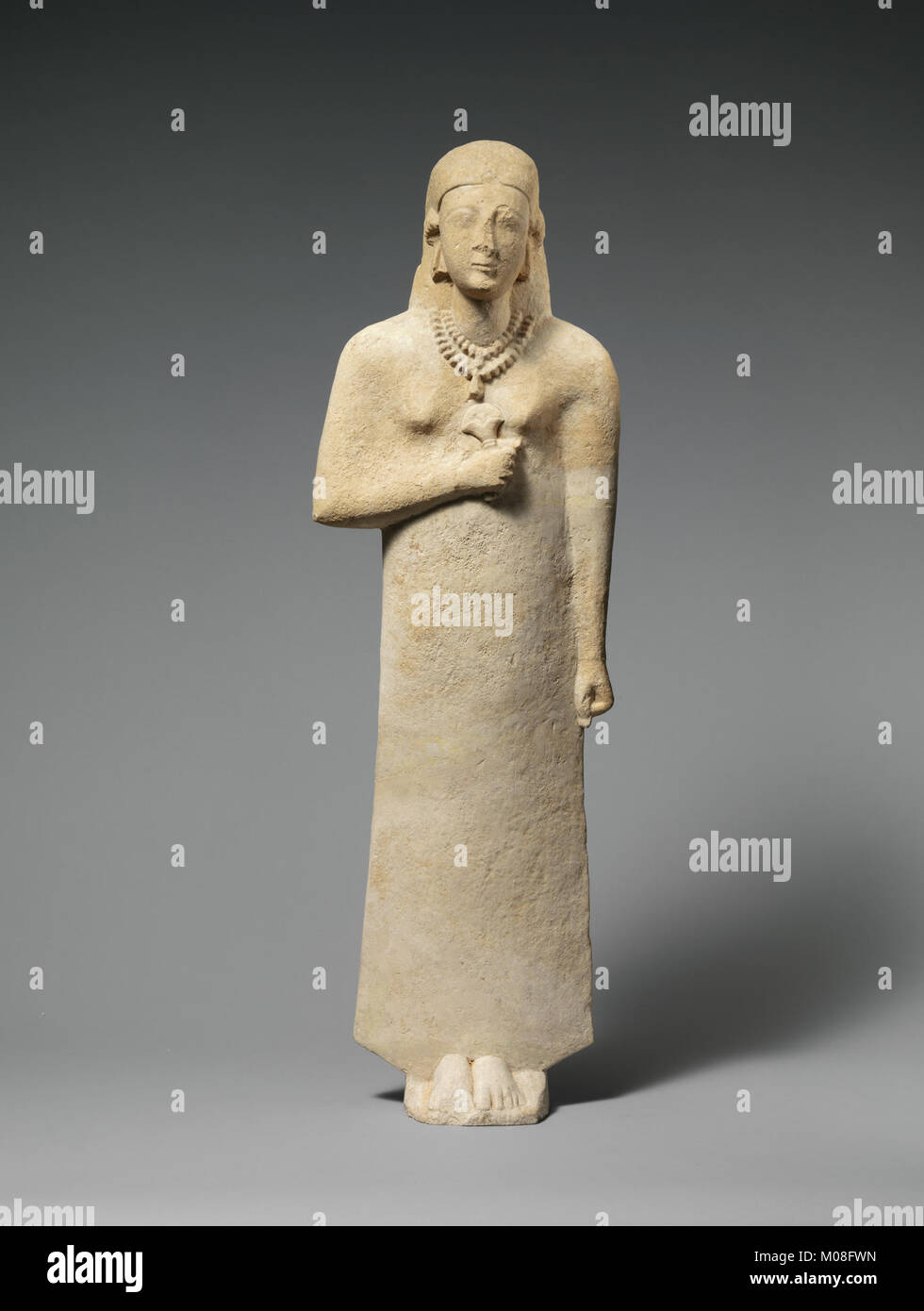 Limestone Statue Example This limestone statue depicts a woman, illustrating sculptural ...